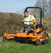 Man on mower to illustrate machinery hire day rate package from Marcus Young Landscapes Ltd