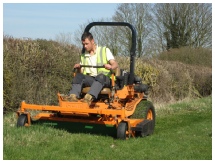 Man on mower to illustrate machinery hire day rate package from Marcus Young Landscapes Ltd
